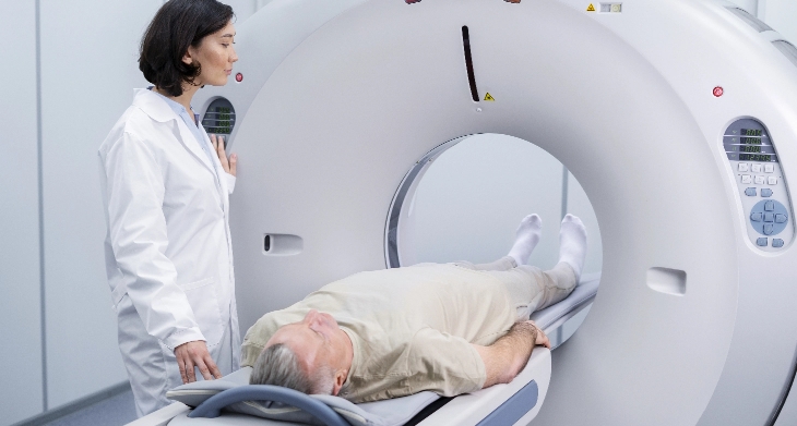 doctor-getting-patient-ready-ct-scan