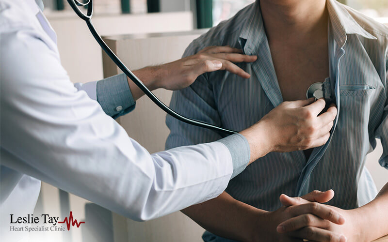 Doctor Using A Stethoscope To Check Patient Heartbeat