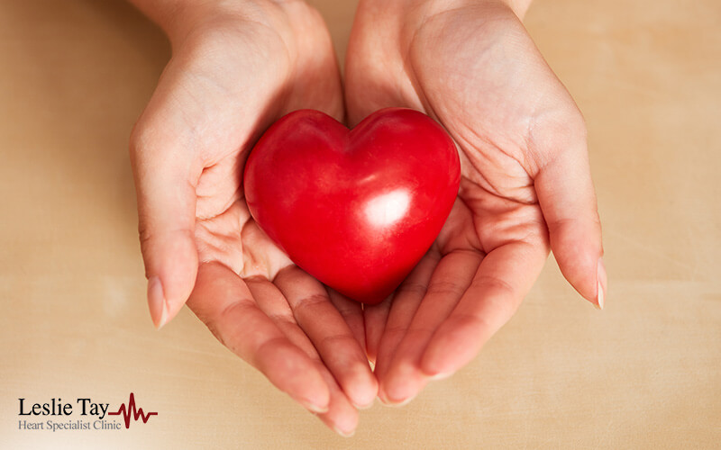 Woman Holding Red Heart
