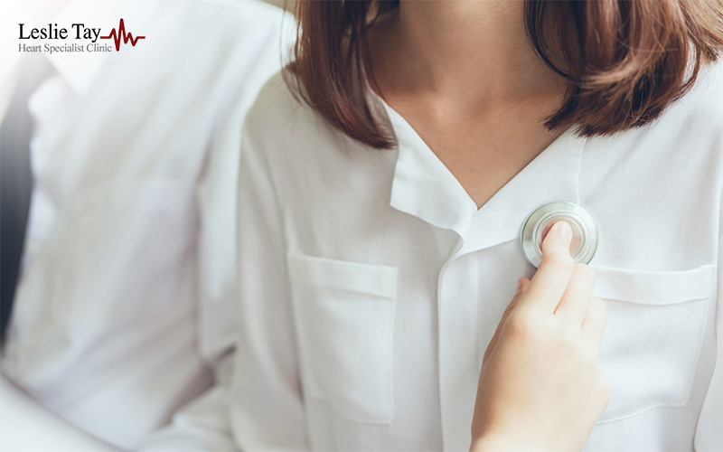 Cardiologist diagnosing for heart pain