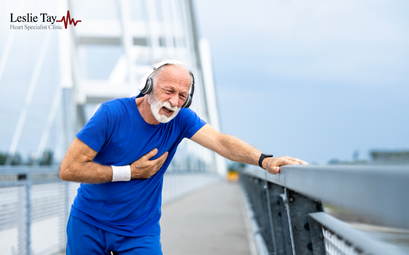 An elderly man experiencing chest pain while exercising outdoors.